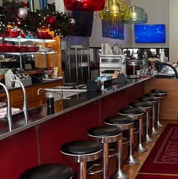 Counter and stools inside Cafe Italiano at the Sweet Shop